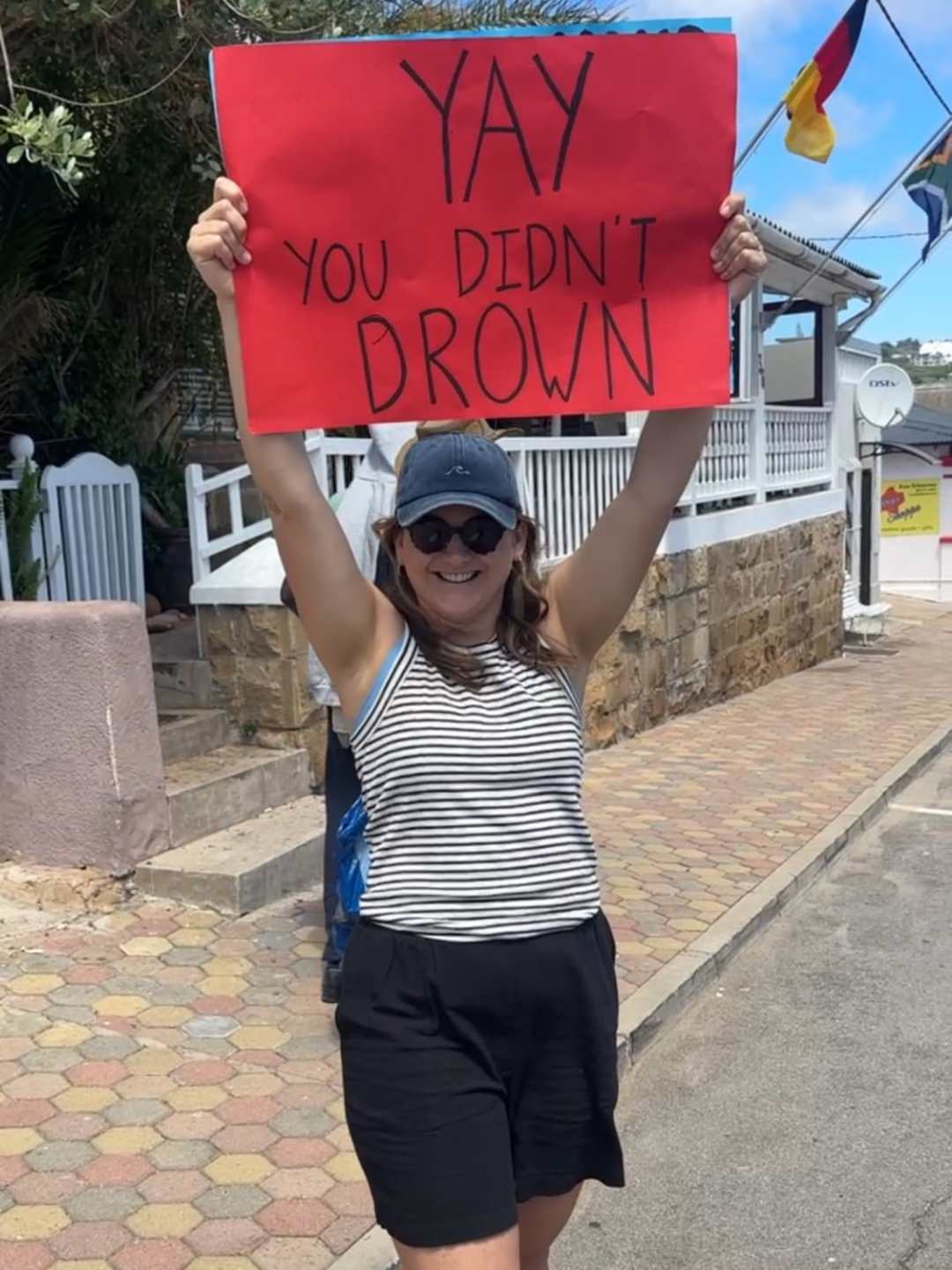 Motivational running sign that says, "Yay! You didn't drown."